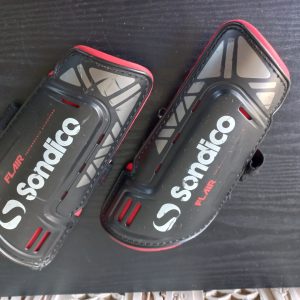 Red Shin Guards